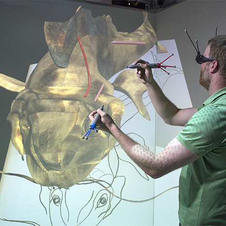 Artist creates a 3D model using a spatial interface